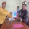 Elvanadi Serahkan Berkas Pencalonan Kepala Desa Air Merbau, Diiringi Adat Melayu Belitong